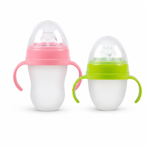 Pink and green silicone baby bottles with dual handles and protective caps